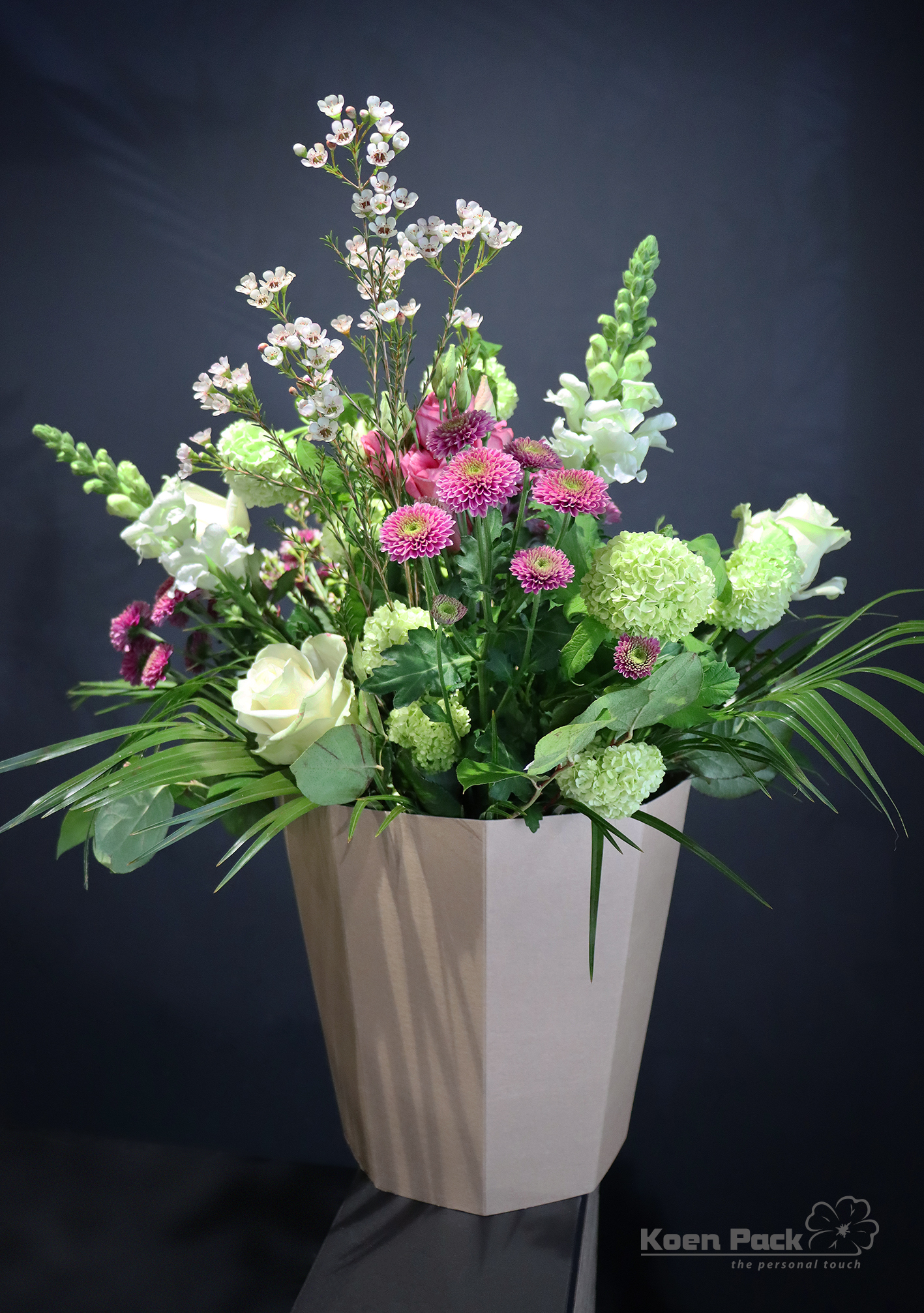 Cardboard buckets with flowers